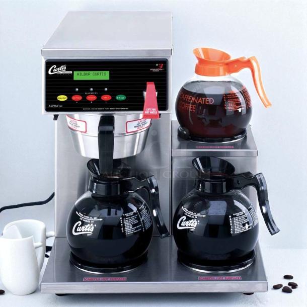 Curtis Alpha 3DR coffee brewer with three lower warmers, great condition, 120/220V, tested and working, visible Curtis branding.