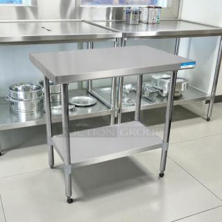 GSW 30” x 18” stainless steel worktop table in great condition, features a lower shelf and adjustable feet.