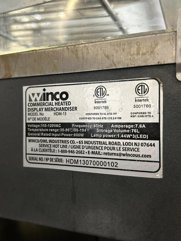 Winco HDM-13 heated display case, 13 1/2" countertop model, 3 shelves, 120V. Tested, working, and certified by ETL.