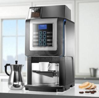 Necta Kometa automatic espresso machine, 120V, tested and working, in excellent condition. Features digital interface, coffee bean hopper, and cup platform.