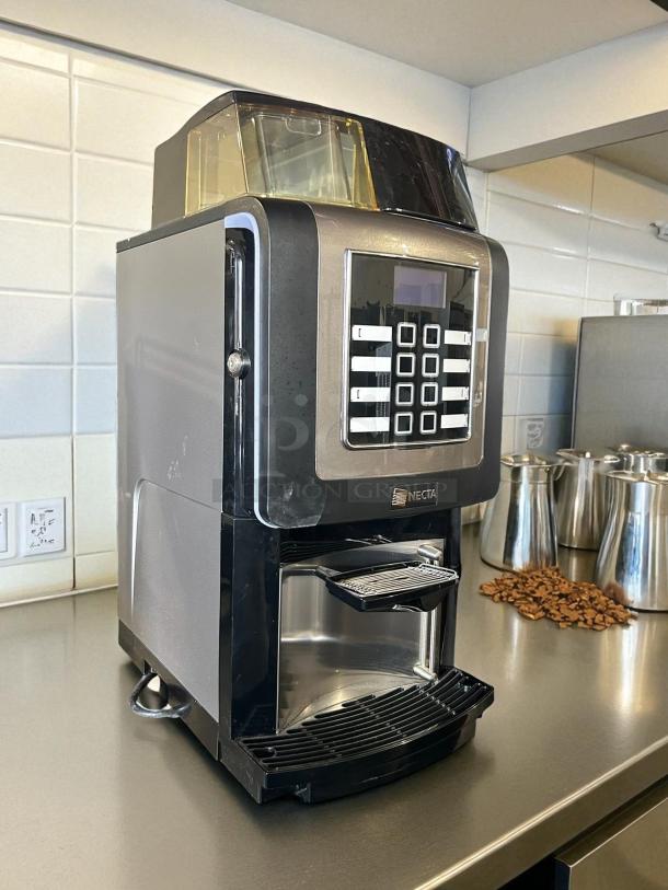 Necta Kometa automatic espresso machine, 120V/60Hz, stainless steel, tested and working, keypad interface, excellent condition.