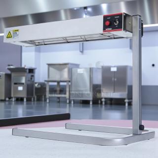 Winco ESH-1 14-Inch Strip Heater in excellent condition with adjustable stand, tested and working. Caution label visible.