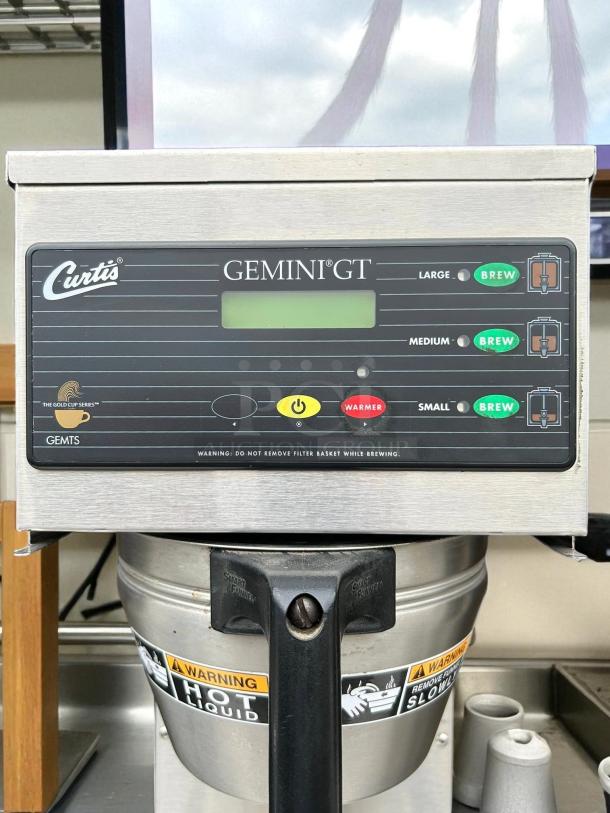 Curtis GEMSS63A1000 coffee brewer, stainless steel, 9-inch, 2.2-gallon tank, tested, excellent condition, digital controls.