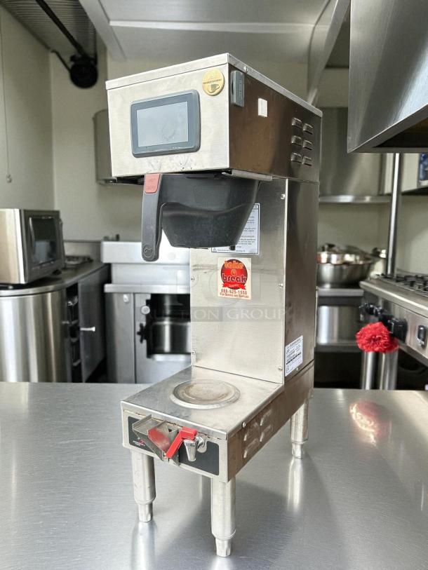 Curtis G4GEMS63A1000 9" automatic coffee brewer, stainless steel, 1-1/2 gallon capacity, tested and working, in good condition.
