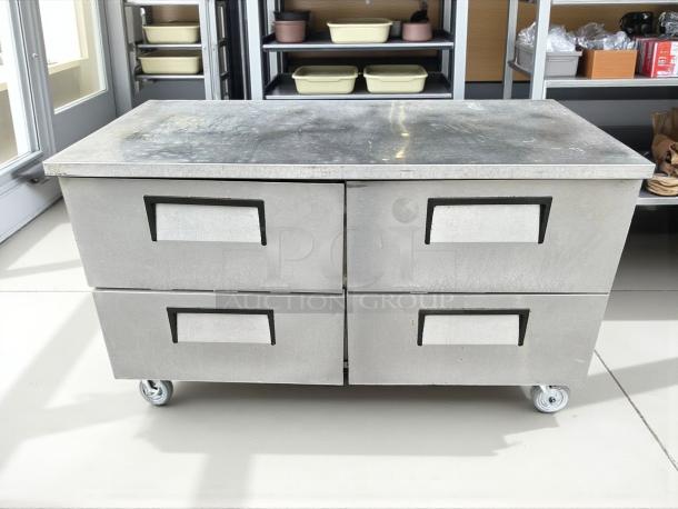 True TUC-60D-4-HC undercounter refrigerator with four drawers, stainless steel, tested, working, on casters.