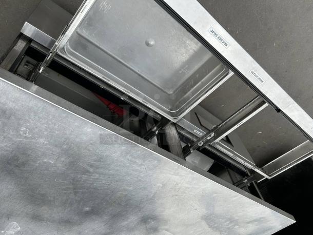 True TUC-60D-4-HC undercounter refrigerator with four drawers, stainless steel, tested and working, good condition.