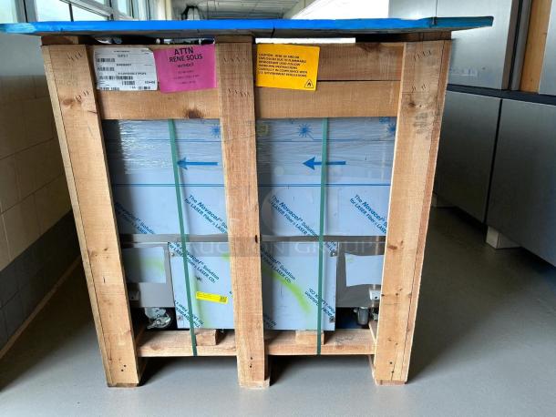 Brand new H&K 52473-1 stainless steel commercial French fry freezer in crate. Includes fry basket holder, casters, 115 volts.