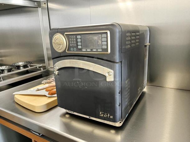 TurboChef NGO Rapid Cook Oven in excellent condition, black with digital controls, tested and working efficiently.