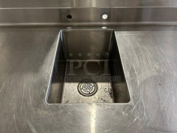Winholt stainless steel sink and work table, 18"x12" basin, great condition, clean surface, holes for fixtures.