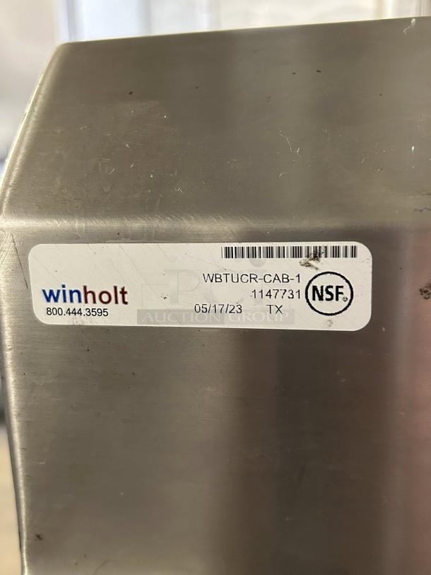 Winholt stainless steel sink and work table, model WBTUCR-CAB-1, 18"x12" baskin sink. NSF certified, excellent condition.