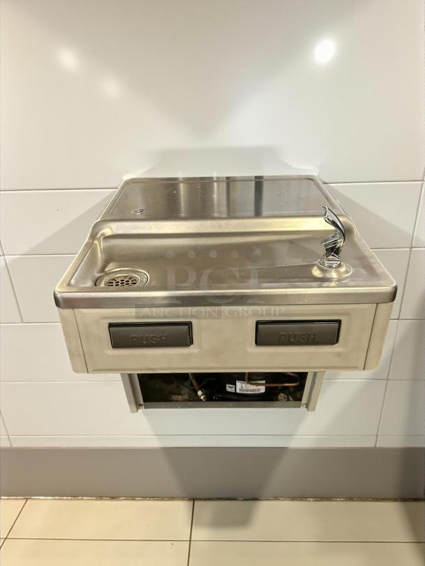 Wall mount ADA water cooler, light gray granite finish, tested and working, 115V, 60Hz, 5 Amps. Push button operation.