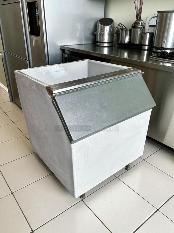 Ice-O-Matic B55PS 30" Ice Bin in great condition, stainless steel, with hinged lid, ideal for commercial kitchens.