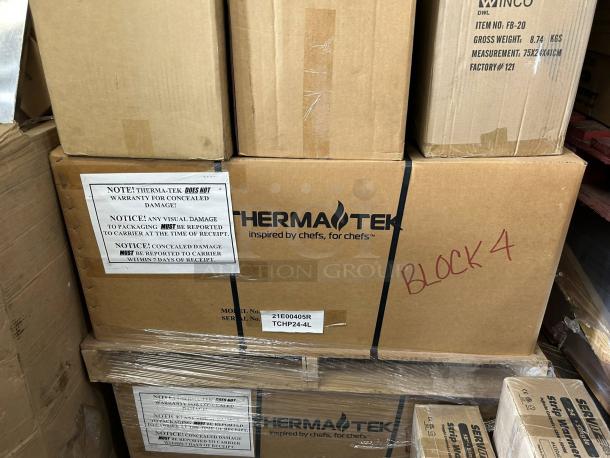 Brand new Therma-Tek TCHP24-4 burner countertop gas hotplate in original packaging, boxed with labels noting warranty and damage reporting.