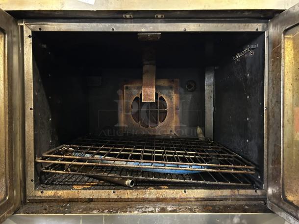 Wolf commercial gas double-deck convection oven interior, showing standard depth and used condition.