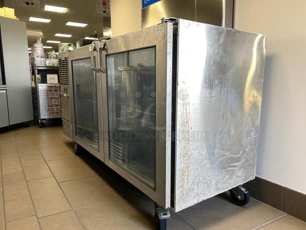 Glastender LP60 60" two-section back bar cooler with glass doors, tested and working, slight surface wear, on caster wheels.