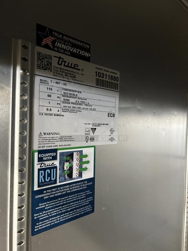 True T-49F-HC reach-in freezer, excellent condition, stainless steel, 49 cu. ft., tested and working, model and safety labels visible.