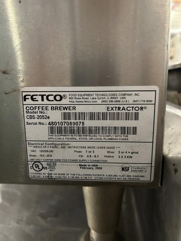 Fetco CBS-2052e Dual Station Coffee Brewer label, stainless steel, model and serial number visible. Fully tested, works well.