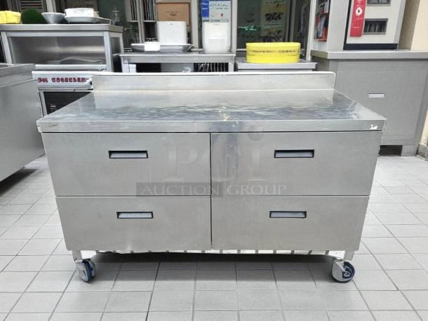 Delfield STD4464NP-8 64" refrigerated sandwich prep table with 4 drawers, 4" backsplash, on wheels, tested and working.