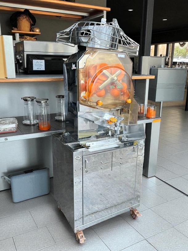 Citrocasa 8000 SB-ATS Advance Citrus Juicer, stainless steel, tested and working, features visible fruit processing mechanism.