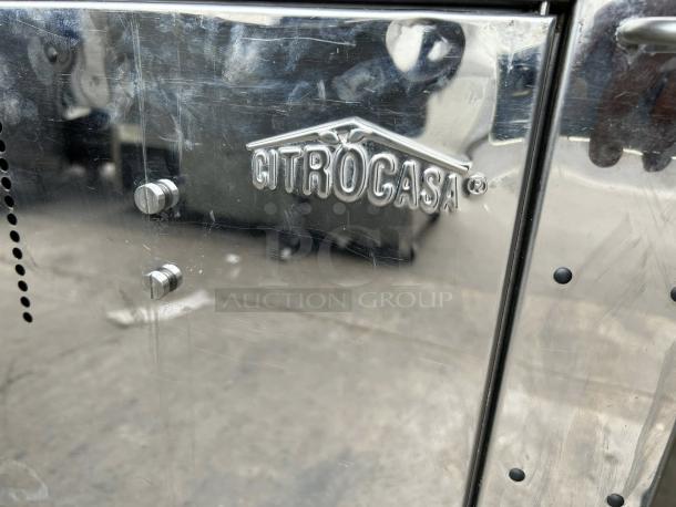 Citrocasa 8000 SB-ATS Advance Citrus Juicer, stainless steel, tested and working, Citrocasa logo displayed, slight wear.