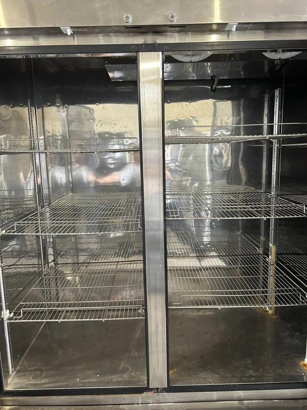 Turbo Air TSR-72SD-N 82" reach-in refrigerator. Excellent condition, bottom-mounted, solid doors, multiple shelves.