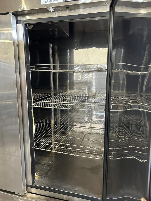 Turbo Air TSR-72SD-N 82" stainless steel reach-in refrigerator, excellent condition, three solid doors, interior shelving.