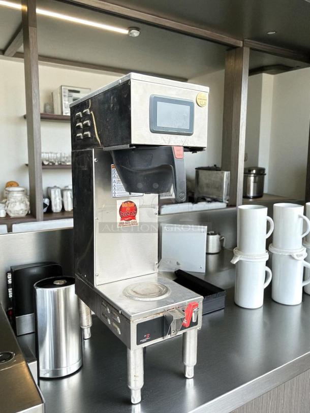 Curtis GEMSS63A1000 automatic coffee brewer with lower warmer and hot water faucet, excellent condition, fully tested, 120/220v.