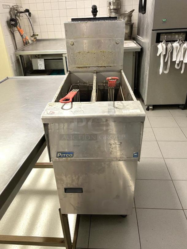 Pitco SG14T-S gas fryer, dual 25 lb vats, floor model, excellent condition, stainless steel with visible brand logo and controls.
