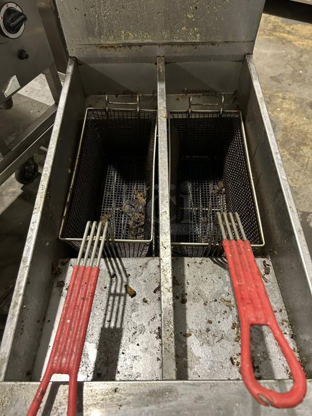 Pitco SG14T-S gas fryer, two 25 lb vats, red handles, tested and working, floor model, natural gas, excellent condition.