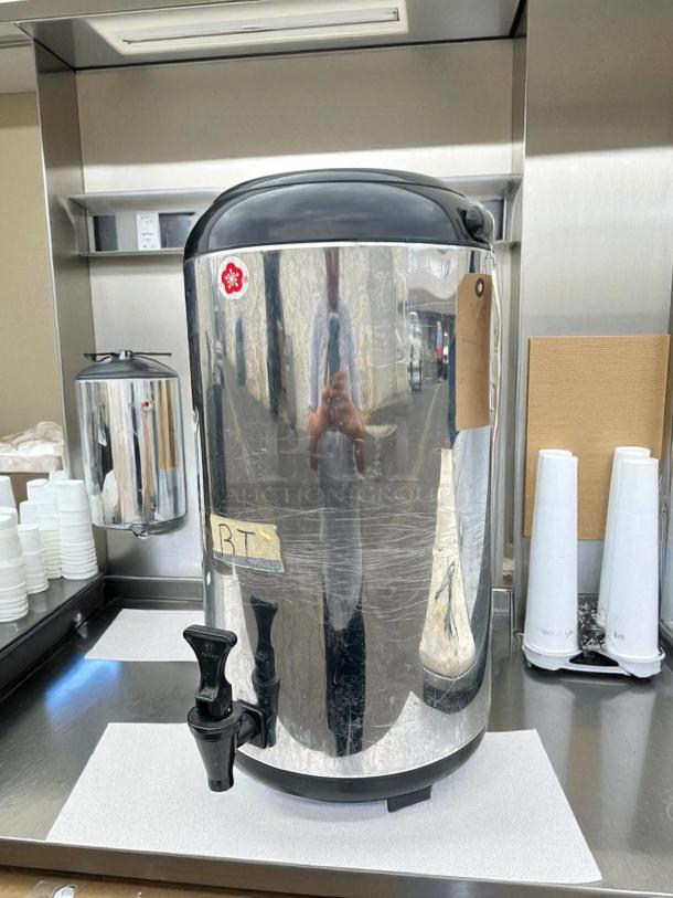Aung Hua heat-preservation tea barrel, excellent condition, metal body, black lid, tap spout, includes label "BT".