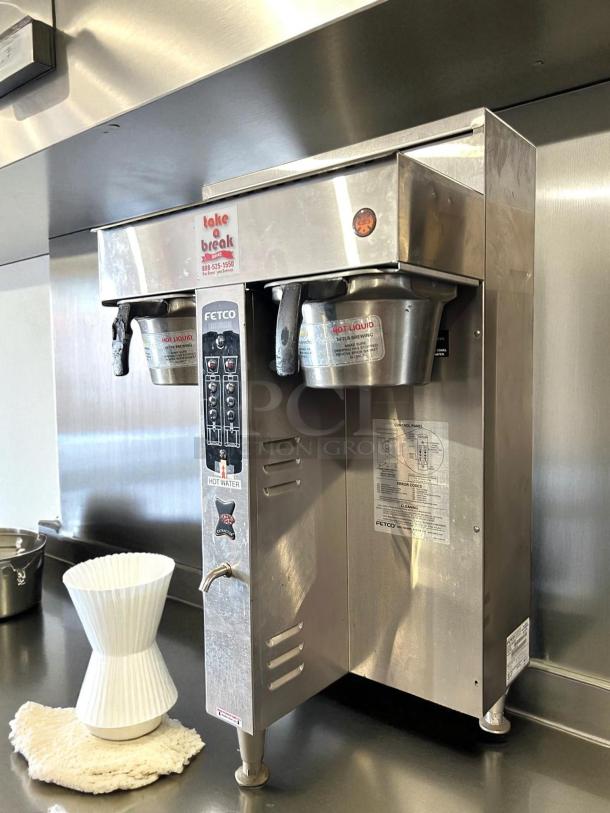 Fetco CBS-2052e dual station coffee brewer in amazing condition, 208-240V, stainless steel, fully tested and working.