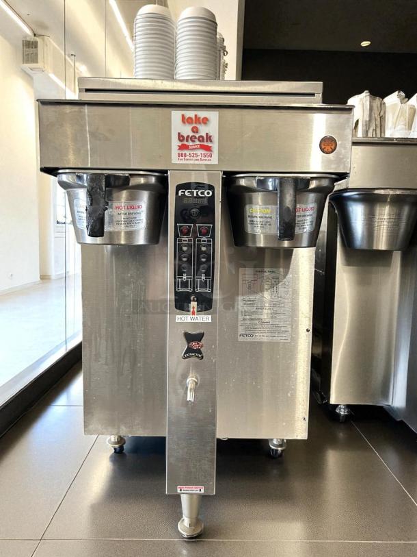 Fetco CBS-2052e dual station coffee brewer, excellent condition, 208-240V, control panel and labels visible, fully tested.