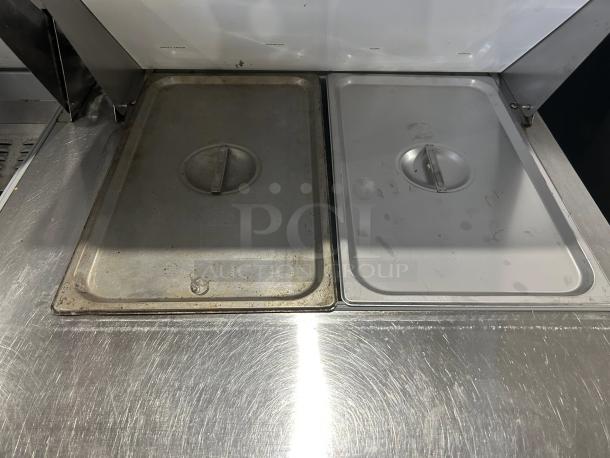 Continental DL60-24M Mighty Top Sandwich Prep Unit in excellent condition, showing stainless steel lids and 60-inch prep area.
