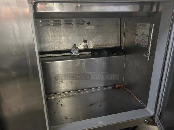 Continental DL60-24M Mighty Top Sandwich Prep Unit, 60" stainless steel, 17 cu ft, interior view, excellent condition.