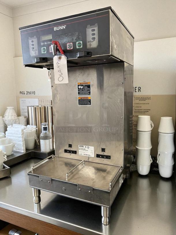 Bunn 33500.0001 Dual Soft Heat DBC Brewer with funnel locks, stainless steel, tested, working condition. Tags and model label visible.
