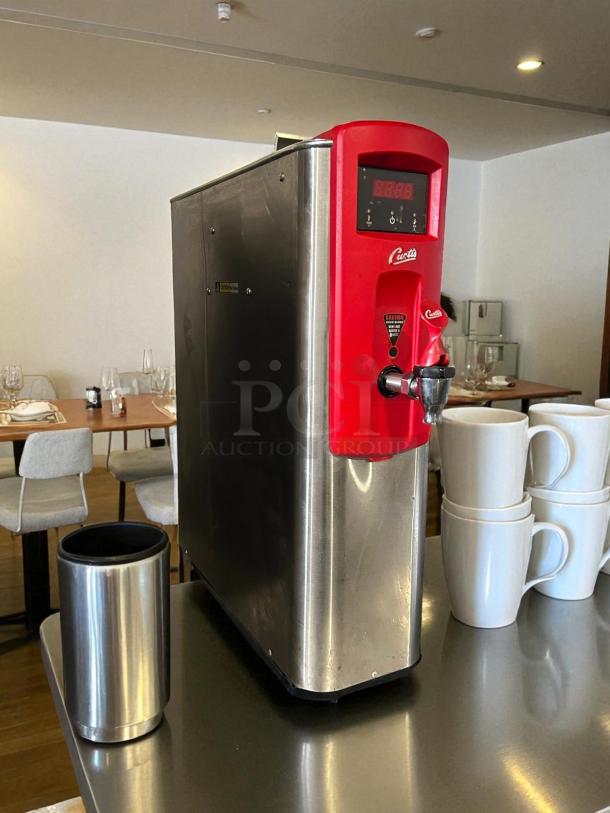 Curtis WB5N 7-inch electric hot water dispenser, excellent condition, 5-gallon capacity, red accents, tested, and working.