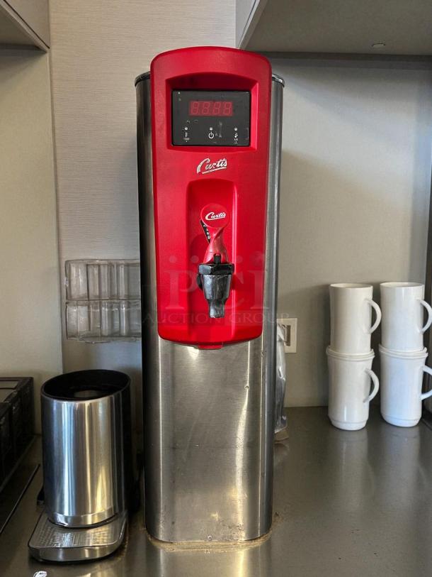 Curtis WB5N electric hot water dispenser, excellent condition, 7-inch width, 5-gallon capacity, with aerator, tested and working.