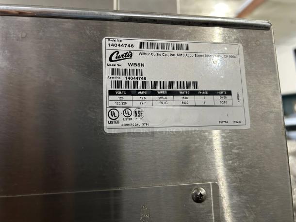 Curtis WB5N electric hot water dispenser, excellent condition, 7-inch, 5-gallon capacity, tested working, with aerator, model details shown.