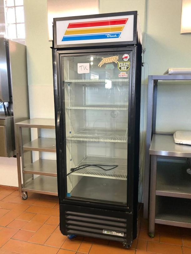 True GDM-23-HC~TSL01 cooler merchandiser with 1 glass door, 23 Cu.Ft, in great condition, tested and working. Stickers visible.