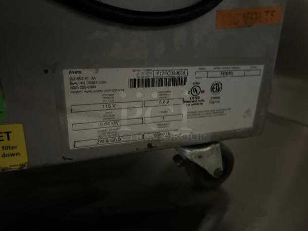 Anets FFM80 80 lb commercial fryer filter; close-up of label with specifications and model details, in excellent condition.