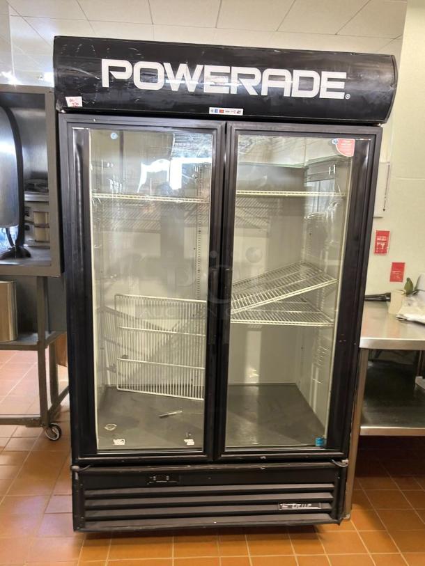 True GDM-43-HC black merchandiser, two glass doors, left/right hinge, tested working, Powerade branding, 47 1/8" wide.