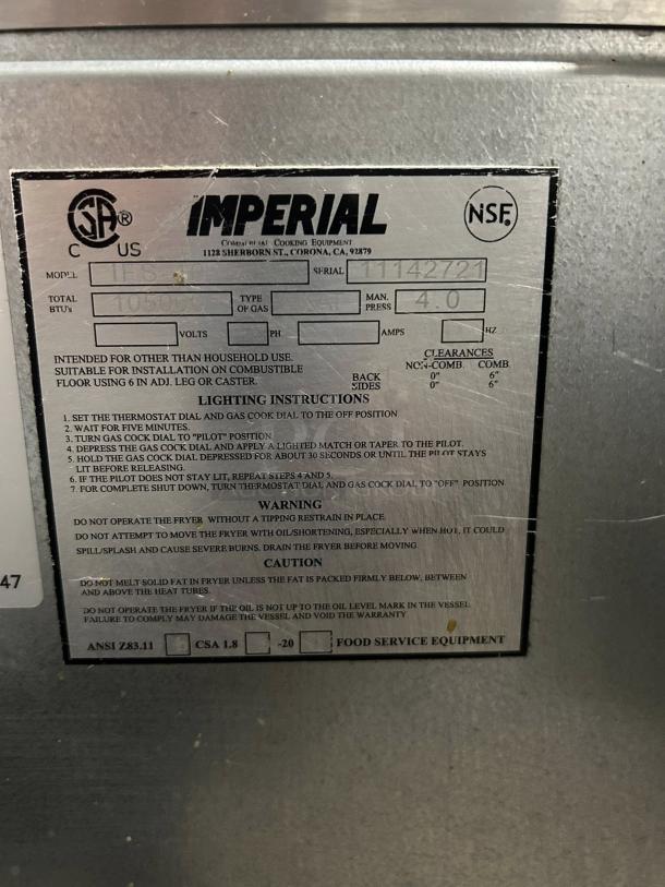 Imperial IFS-40 40lb gas deep fat fryer in great condition. 105,000 BTU, model tag visible with specifications and warnings.