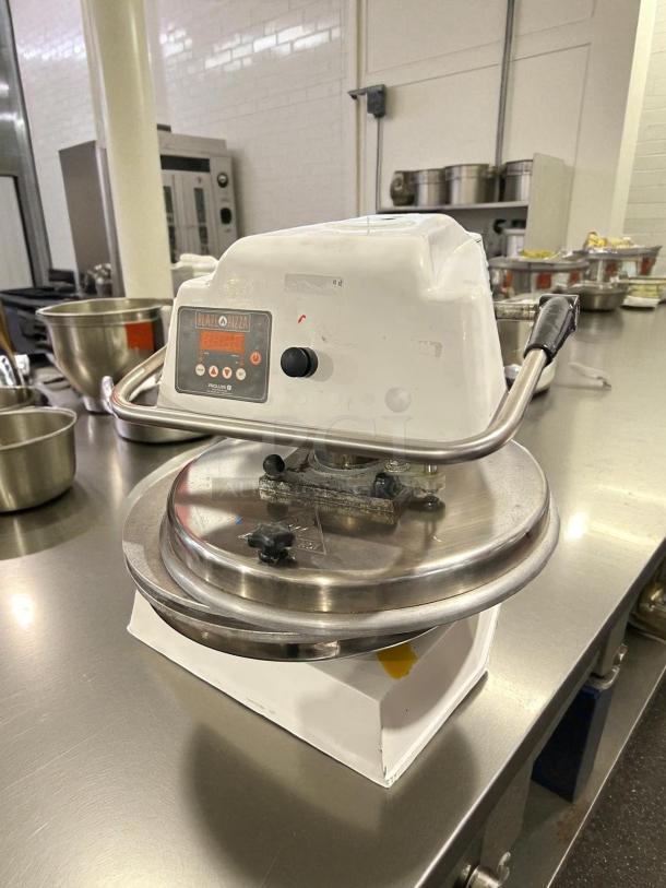 Proluxe Endurance 18" Manual Heavy-Duty Pizza Dough Press; 120V, 1500W; tested, working condition; visible Blaze Pizza label.