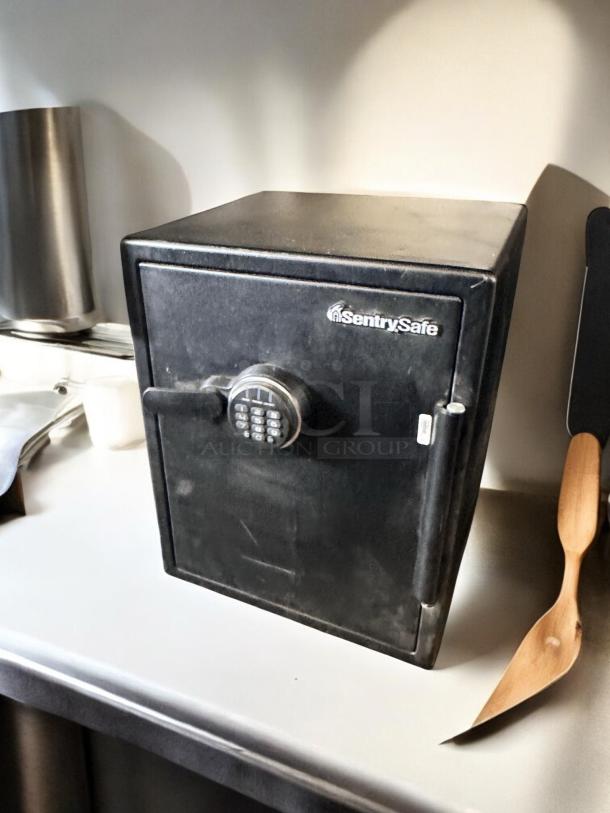 SentrySafe SFW205GPC, fire-resistant, waterproof safe with digital keypad, 2.0 cu ft, outstanding condition, tested working.