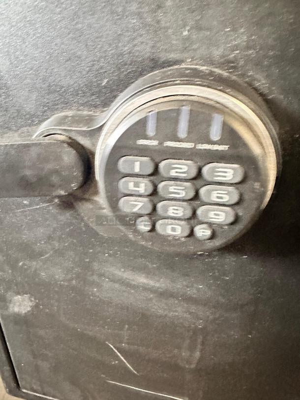 SentrySafe SFW205GPC safe with digital keypad in outstanding condition, fire-resistant and waterproof, 2.0 cu ft.