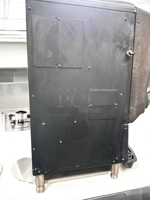 Grindmaster PIC5 dispenser, black casing, great condition, five flavor capacity, 120V, fully tested.