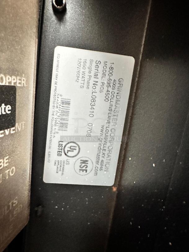 Grindmaster PIC5 dispenser label showing model, serial number, and specifications. UL and NSF certified.