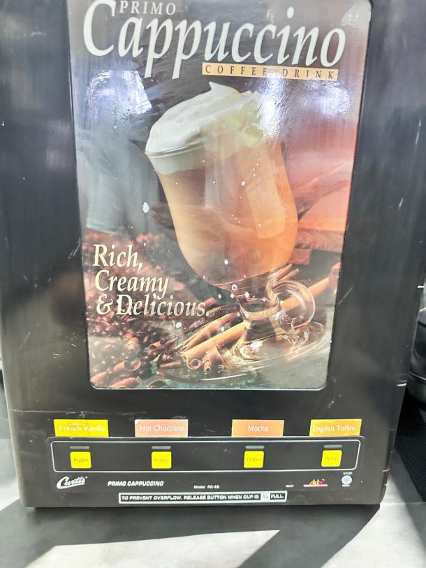 Curtis PC-40 Primo Cappuccino Dispenser, excellent condition, 120V, four flavor buttons. Model labeling and instructions visible.