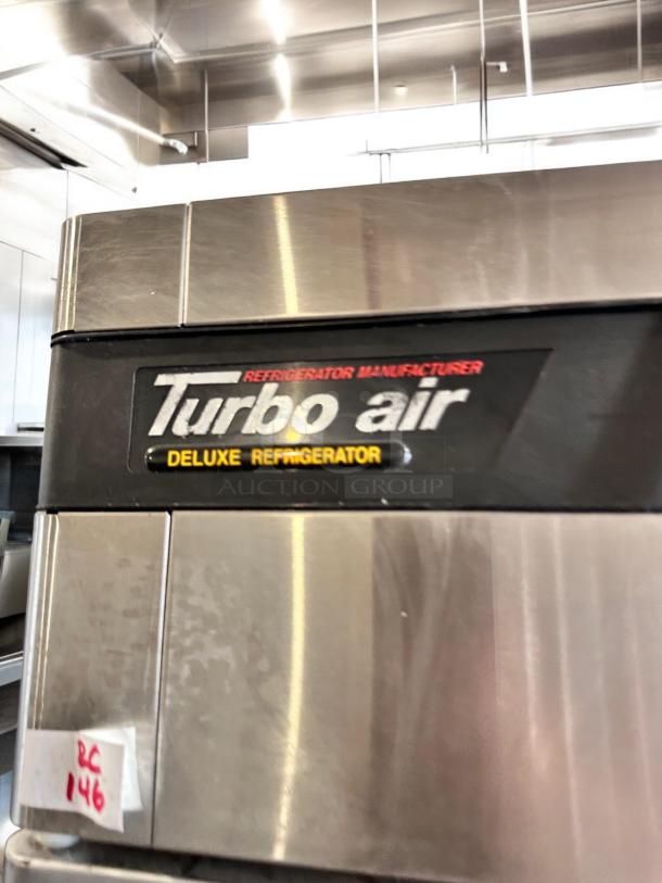 Turbo Air TSR-72SD 3-Door Deluxe Reach-In Refrigerator, stainless steel, outstanding condition, model label visible.