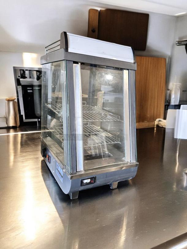 Winco HDM-13 heated display merchandiser, outstanding condition, 120V, glass panels, tested and working, made by DWL Industries.